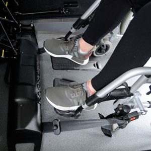 AMF Bruns winch and restraint system for wheelchair and occupant.