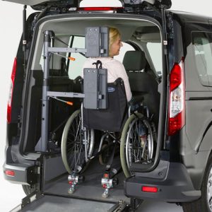 AMF Bruns Futuresafe fitted in vehicle to support and restrain occupant and wheelchair