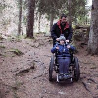 K2 manual wheelchair with built in shock-absorption for bumping, downhill terrains.
