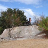 Trekinetic K2 manual wheelchair on top of a large rock formation.